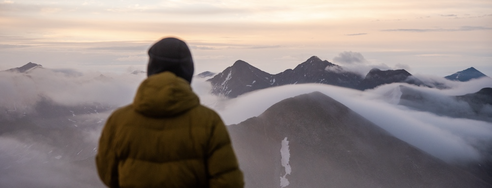 guide looking at mountains header.png